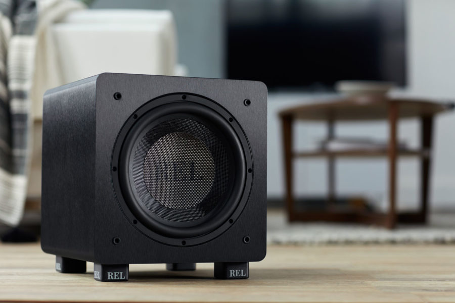 A small REL Subwoofer in a living room.